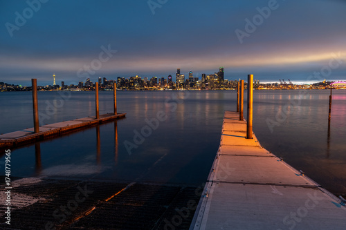 Beautiful Sunrise Over the City of Seattle Across Elliott Bay and the Don Armeni Boat Ramp. Located south of the Duwamish Head, Don Armeni is the most popular of Seattle's saltwater boat ramps.