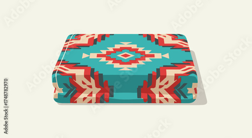 A neatly folded turquoise blanket featuring a vibrant red and white Southwestern geometric pattern on a plain background.