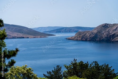Prvić Island and Sveti Grgur, Croatia - April 20, 2025: Panoramic view of the mountains and sea.