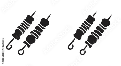 Simple black and white illustration of four meat skewers on white background