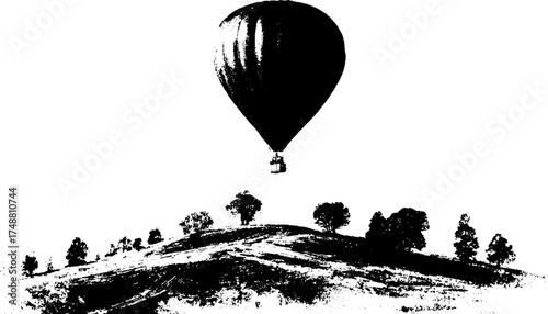 Black and white hot air balloon over rolling hills stencil illustration