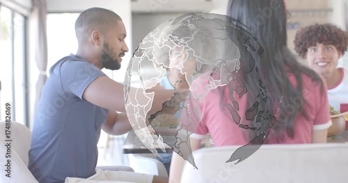 Bearded man grabbing fries sparking rotating globe sweeping table illustrating global tech link