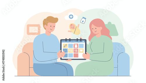 Joyful couple organizes their babys important dates and health appointments on a calendar