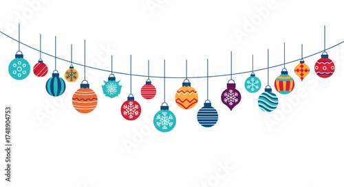 Festive holiday ornaments hang on a string creating a cheerful decoration.