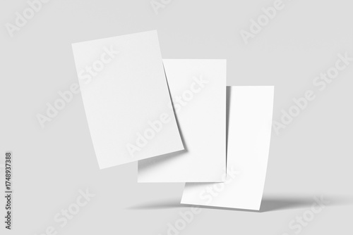 Three Blank White Paper Sheets Floating Mockup on Neutral Grey Background