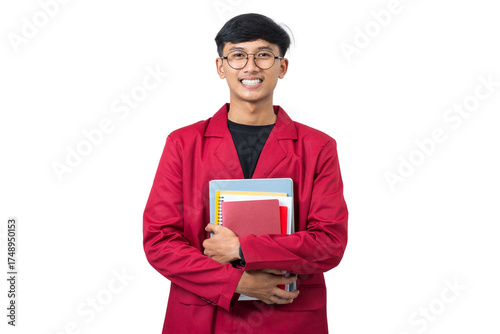Smiling young college student holding books isolated on white background