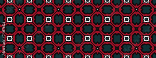 A repetitive geometric pattern with a central dark green motif bordered by deep red shapes and white squares arranged diagonally.
