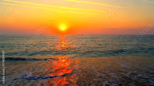 Beautiful summer sunrise over the beach