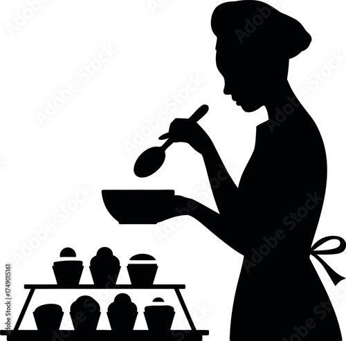 Silhouette of a person baking cupcakes