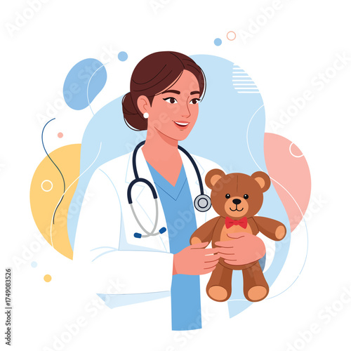 Female doctor holding a teddy bear, wearing a white coat and stethoscope.