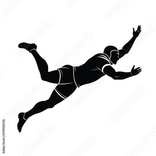 Silhouette of a rugby player diving with arms outstretched