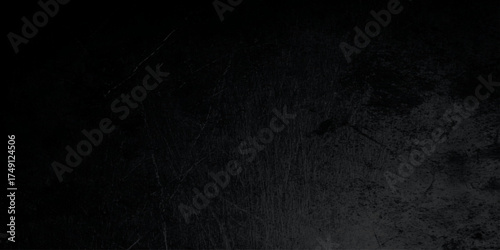 Dark black wall texture with rough surface details, perfect for backgrounds, interior design, and digital artwork, grunge concrete surface, black wall texture or grunge black board or chalk board.