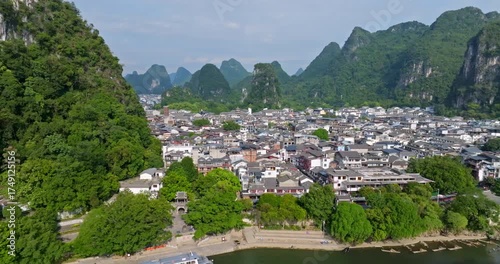 Wallpaper Mural Aerial tracking shot in front of the Yangshou town, sunny, summer day in China Torontodigital.ca