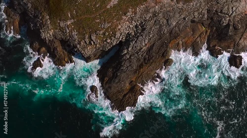 Rocky Coastline Of Island Hit By Strong And Powerful Waves. - aerial shot