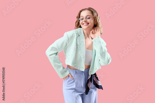 Happy young woman in stylis...