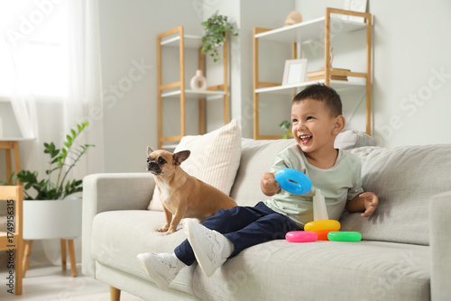 Cute little Asian boy playi...