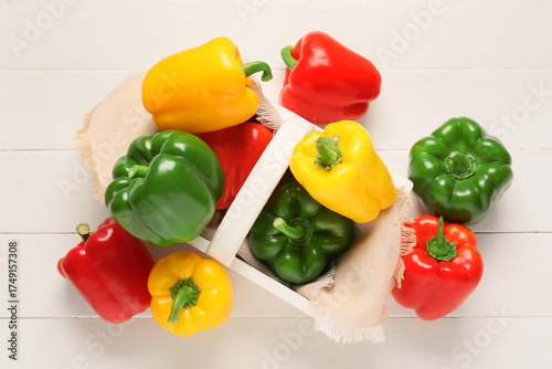 Colorful bell peppers in wo...