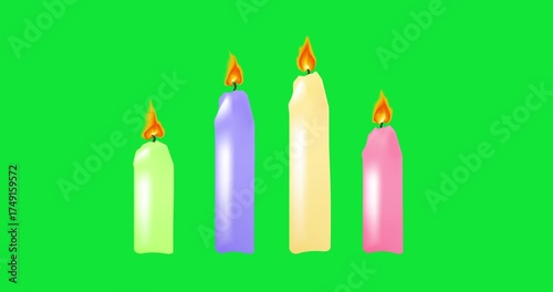 Four beautiful Advent Christmas candles. On Christmas Day colored burning candles  on green background. Animation Christmas Advent banner. 4K video animation
