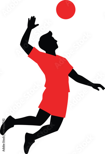 Silhouette of a volleyball player spiking the ball in mid air
