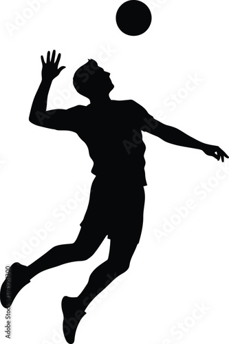 Silhouette of a volleyball player spiking the ball