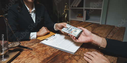 Принти на полотні Person handing money over contract agreement