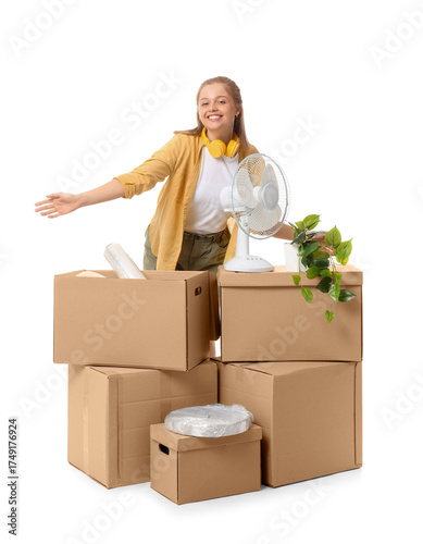 Young woman with moving box...