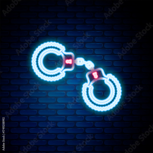 Glowing neon line Sexy fluffy handcuffs icon isolated on brick wall background. Handcuffs with fur. Fetish accessory. Sex shop stuff for sadist and masochist. Colorful outline concept. Vector