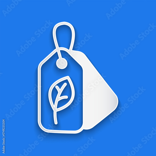Paper cut Tag with leaf symbol icon isolated on blue background. Banner, label, tag, logo, sticker for eco green. Paper art style. Vector
