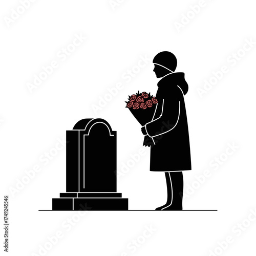 Silhouette of grieving woman by headstone
