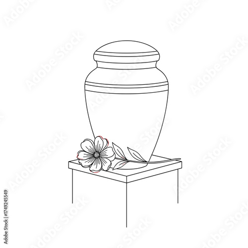 Cremation urn on pedestal with flowers