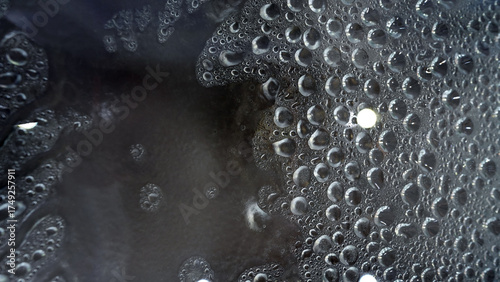 Photos Close-up of condensation droplets on window and surfaces