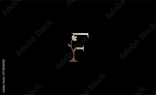 Luxury Logo Lotus or Tulip Flower With Letter F. Nature, Feminine and Beauty with Gold Colour Creative Template. Glamour, Modern and Minimalist Concept