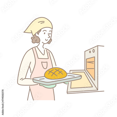 오븐 앞에서 빵을 굽는 여성
