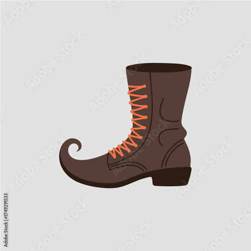 Cartoonish boot with orange laces and a pointed curled toe against a gray background