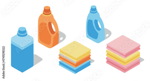 Colorful detergent bottles and folded towels in isometric style on white background