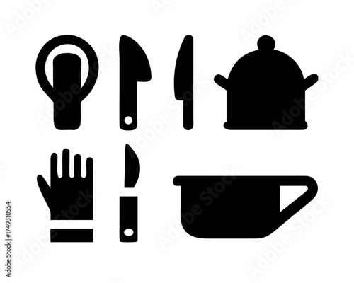 A collection of kitchen tools and cooking equipment