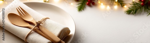 Eco-Friendly Christmas Decorations and Sustainable Holiday Concept, Elegant table setting with wooden cutlery and festive decorations.