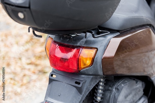 details and elements of a scooter nearby