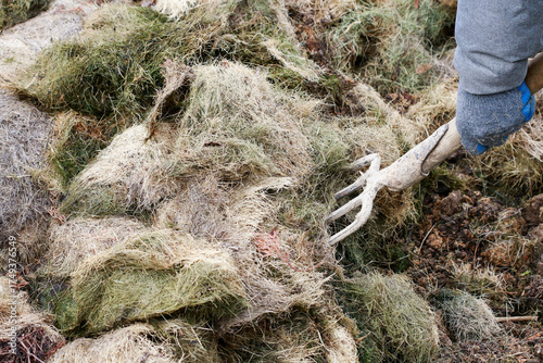 The man prepares the compost. He will use it, for example, in gardens, landscaping, horticulture, urban agriculture and organic farming.