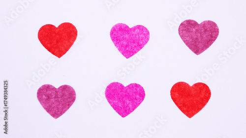 6 paper hearts on a white background