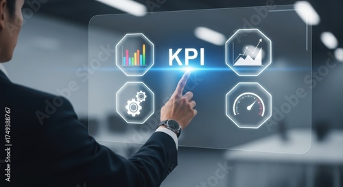 Business professional interacting with kpi dashboard digitally measuring success metrics.