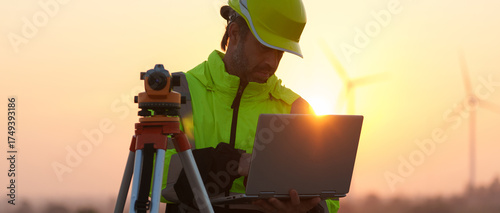 Civil engineers inspect wind farms, power generation systems, natural industry and environmental concepts, clean energy