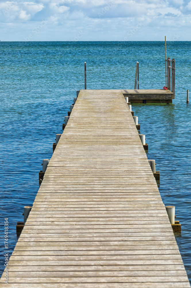 Fototapeta premium Wooden bathing jetty into the Baltic Sea at Hou, Denmark