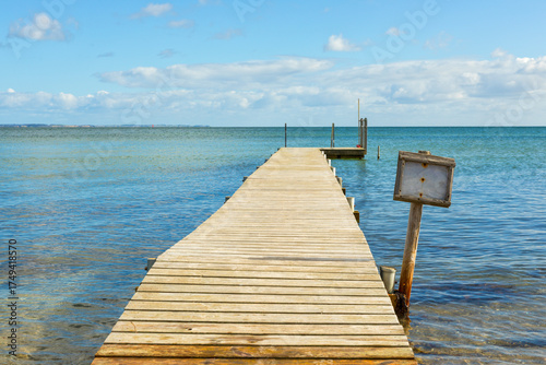 Fototapeta Naklejka Na Ścianę i Meble -  Wooden jetty into the Baltic Sea at the beach of Hou, Denmark