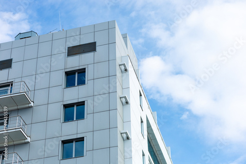 Tableau sur toile A modern building with a curtain-wall ventilated facade made of porcelain stoneware