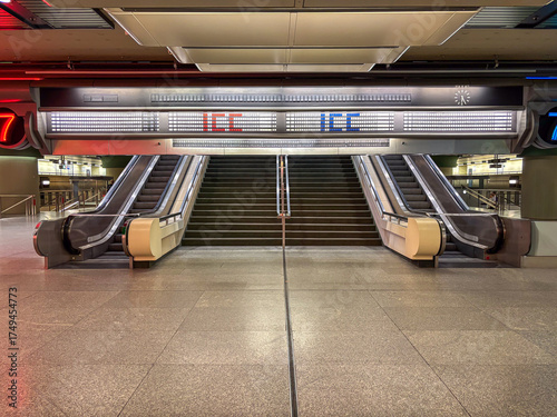 Split-flap display above the staircase leading to the first floor of the International Congress Center, Berlin. The Split-flap display is used for navigation to the 80 halls and rooms.