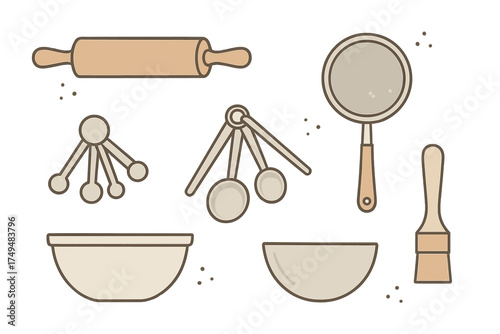 Essential kitchen tools for baking preparation including rolling pin and mixing bowls