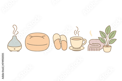 Set of cozy home relaxation items with aroma diffuser and hot beverage