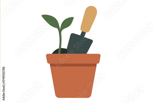 Young green seedling growing in a terracotta pot with a gardening trowel tool