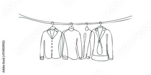 Three garments hanging on a clothesline